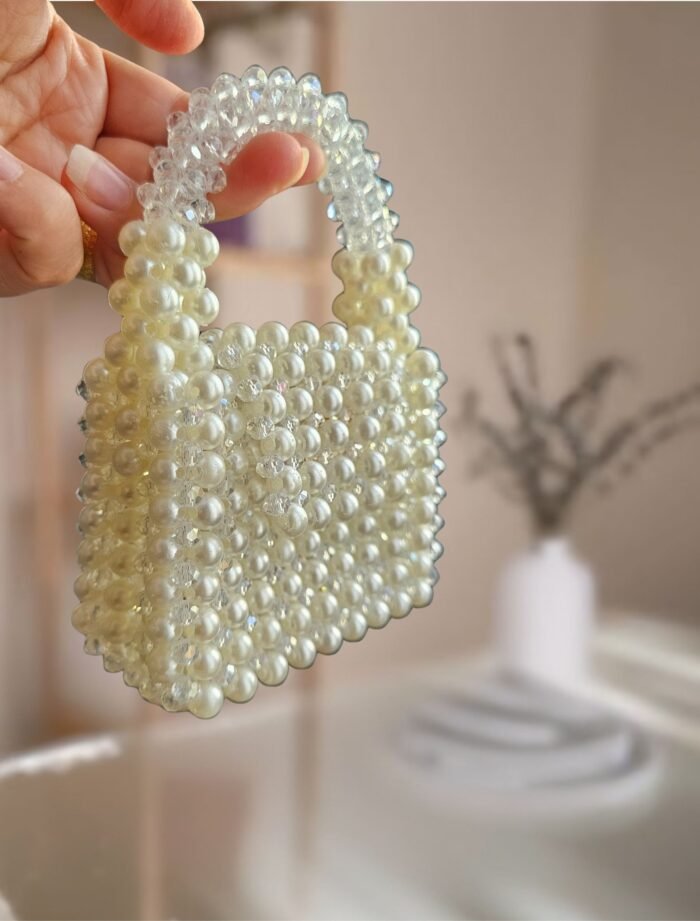 white beaded mini handbag with Transparent shiny handle
