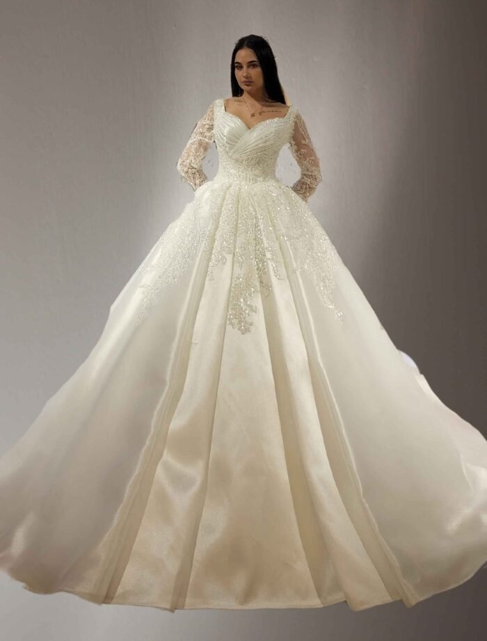 Off-Shoulder Ball Gown Wedding Dress with Long Sleeves - Image 2