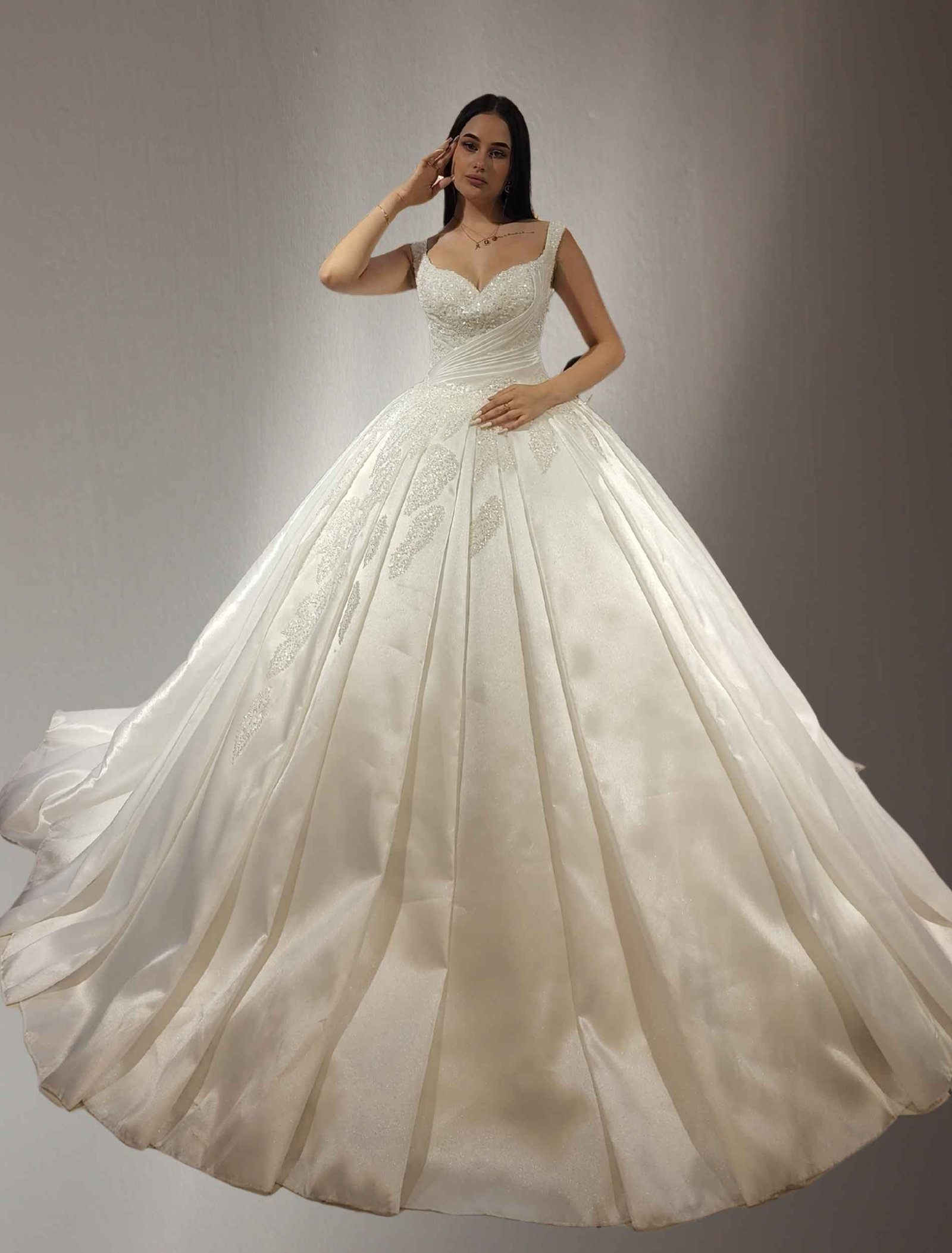 off white wedding dress with off-shoulder neckline and glitter details. - Image 2