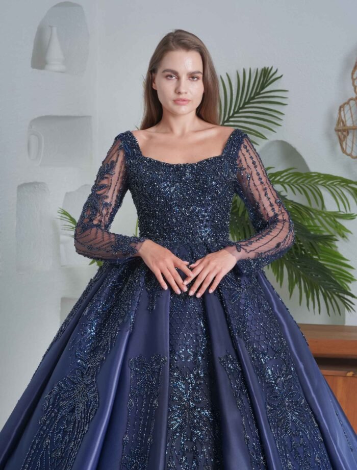 Elegant navy blue ball gown with long sleeves and glitter embroidery. - Image 3