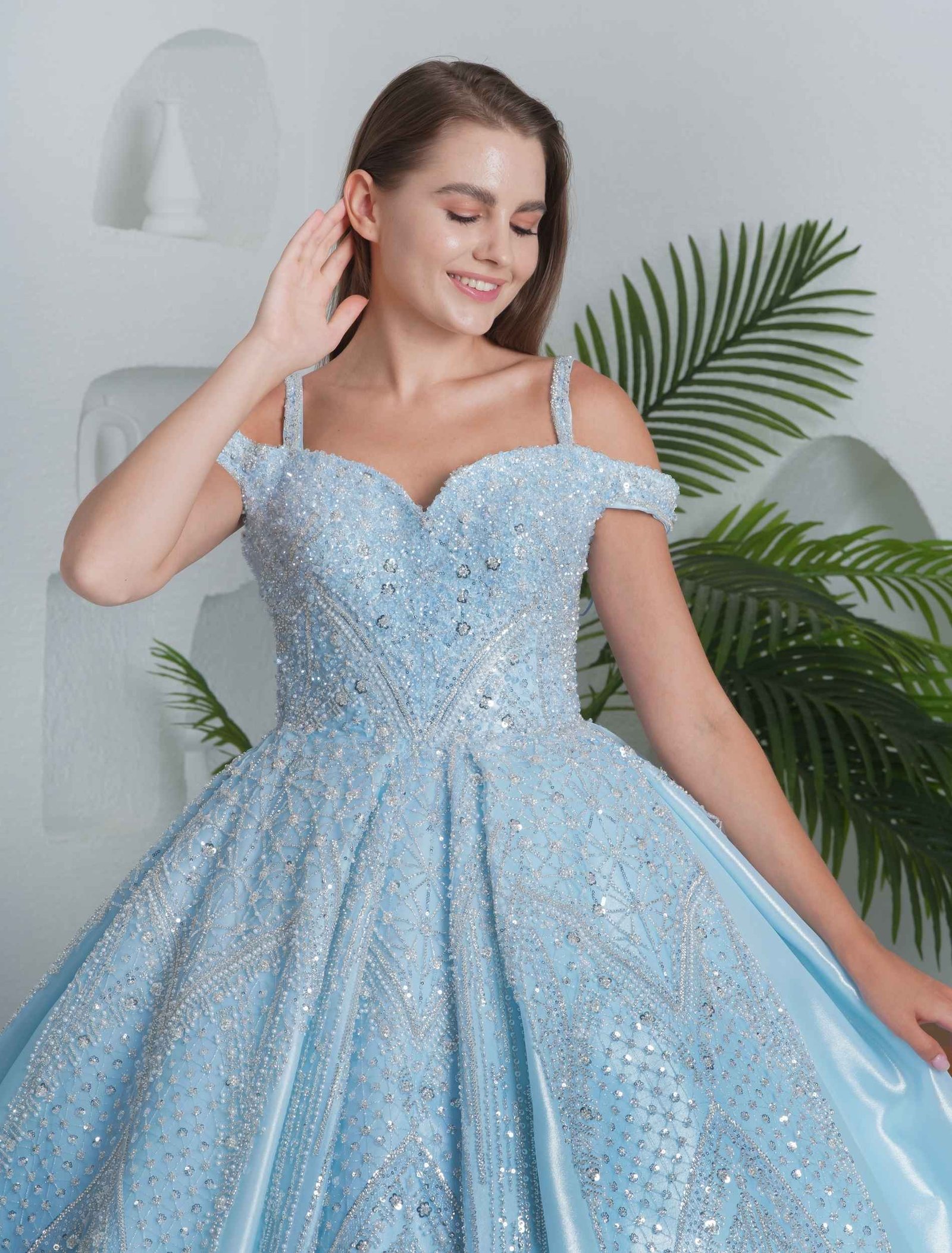 Ice blue ball gown with puff sleeves and shimmering embroidery. - Image 2