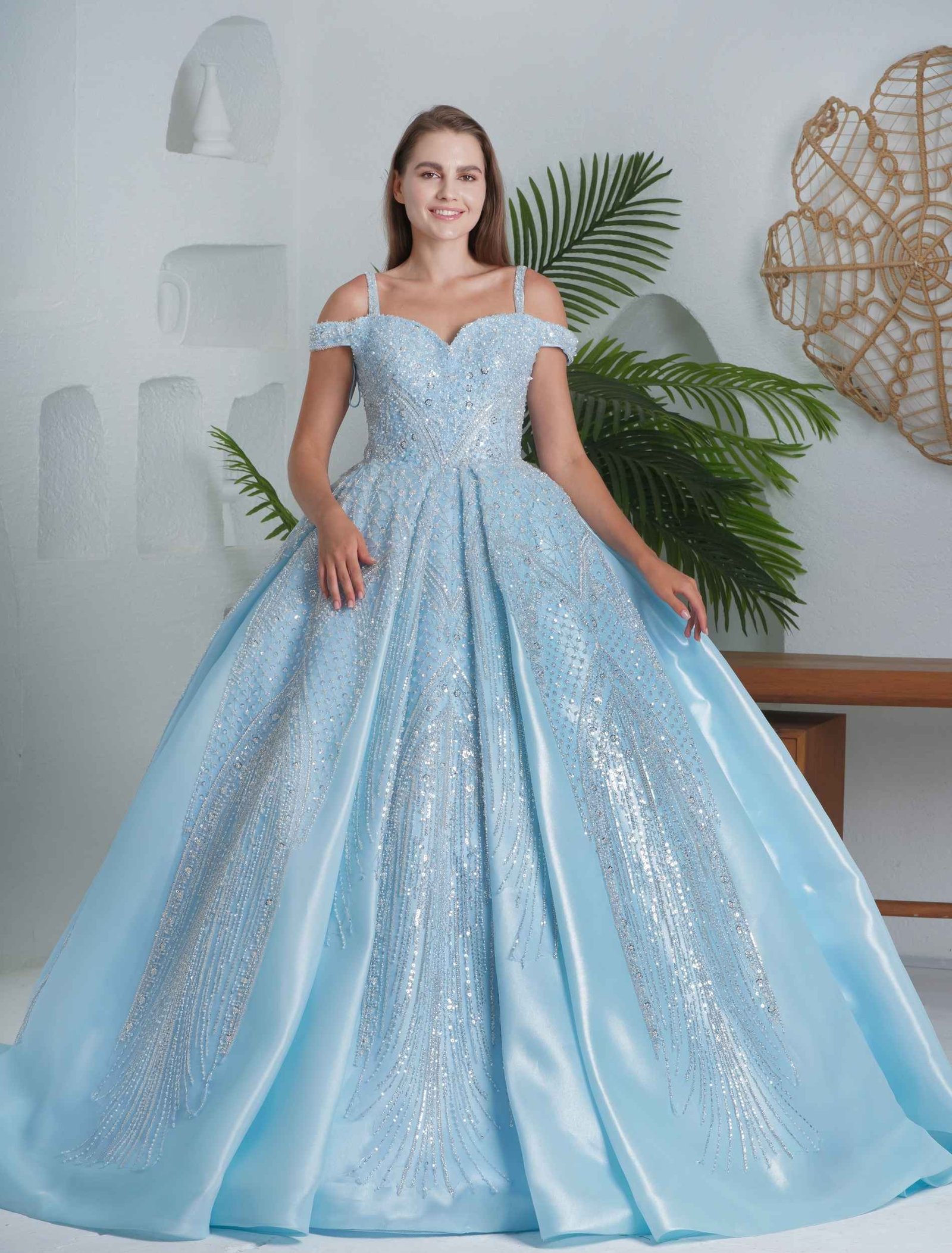 Ice blue ball gown with puff sleeves and shimmering embroidery. - Image 3
