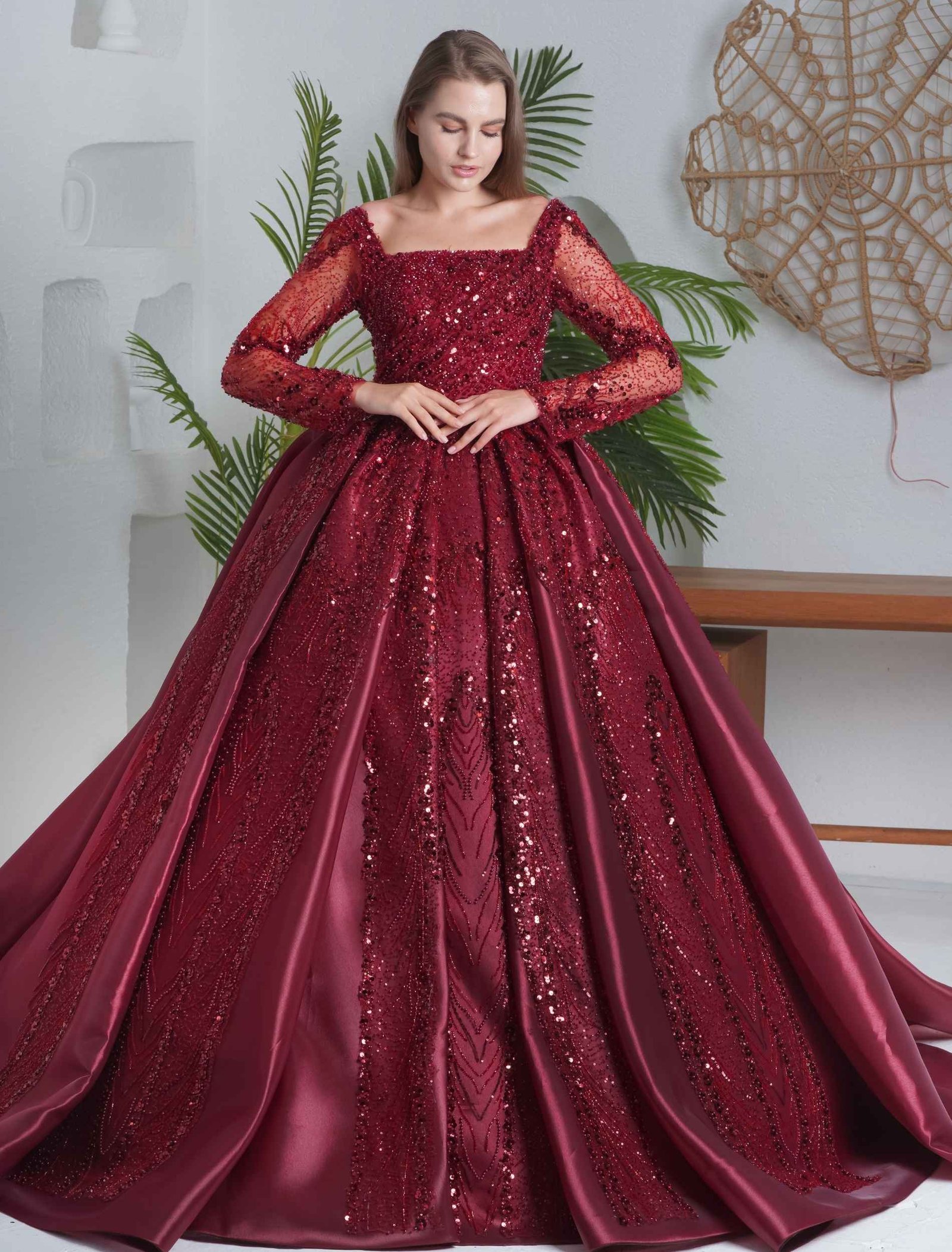 Rich burgundy ball gown with sequin embroidery and long sleeves. - Image 2
