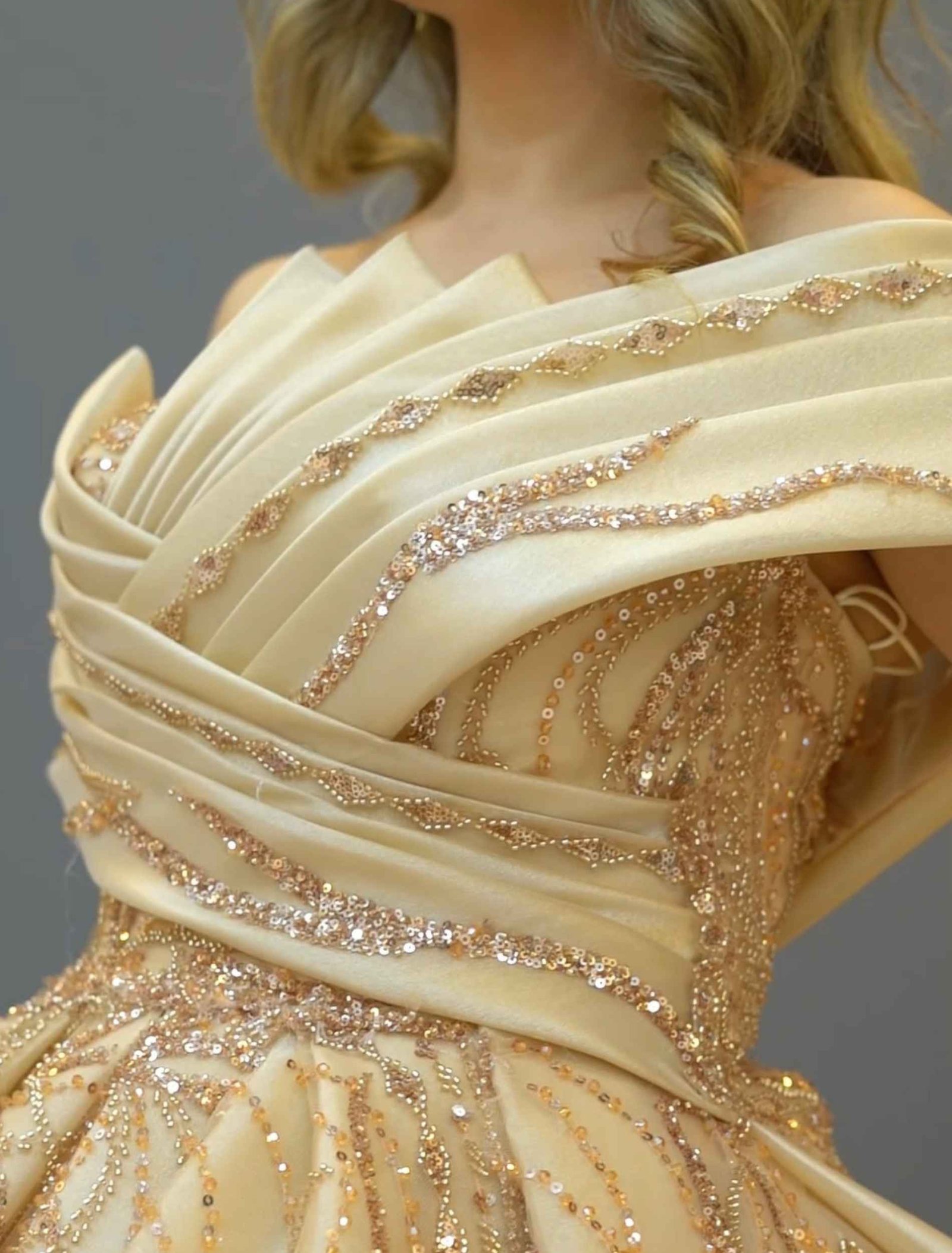 Champagne gold ball gown with off-shoulder neckline and glitter embroidery - Image 2