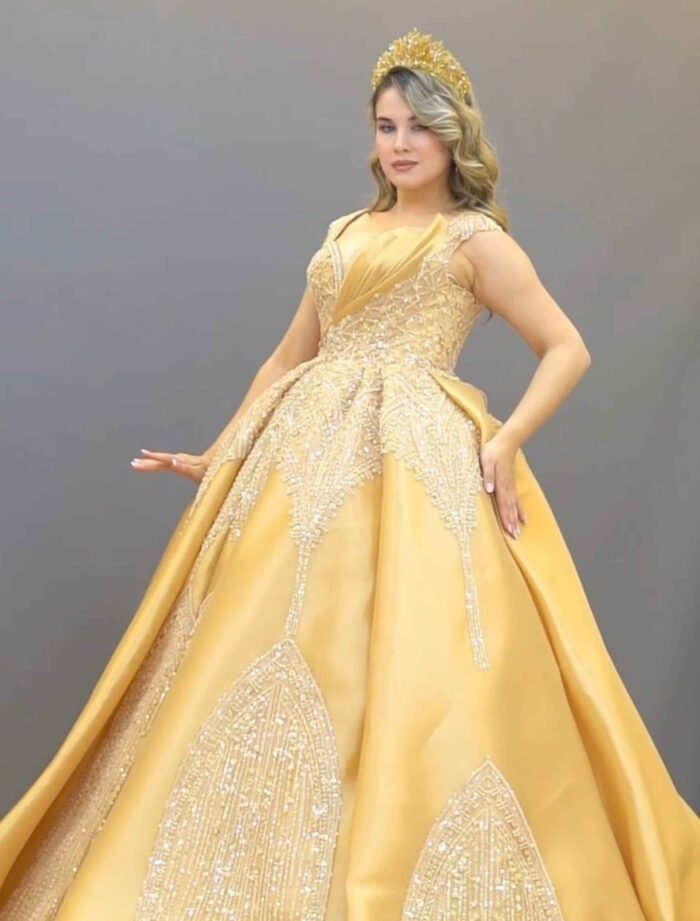 Champagne gold ball gown with off-shoulder neckline and glitter embroidery - Image 2