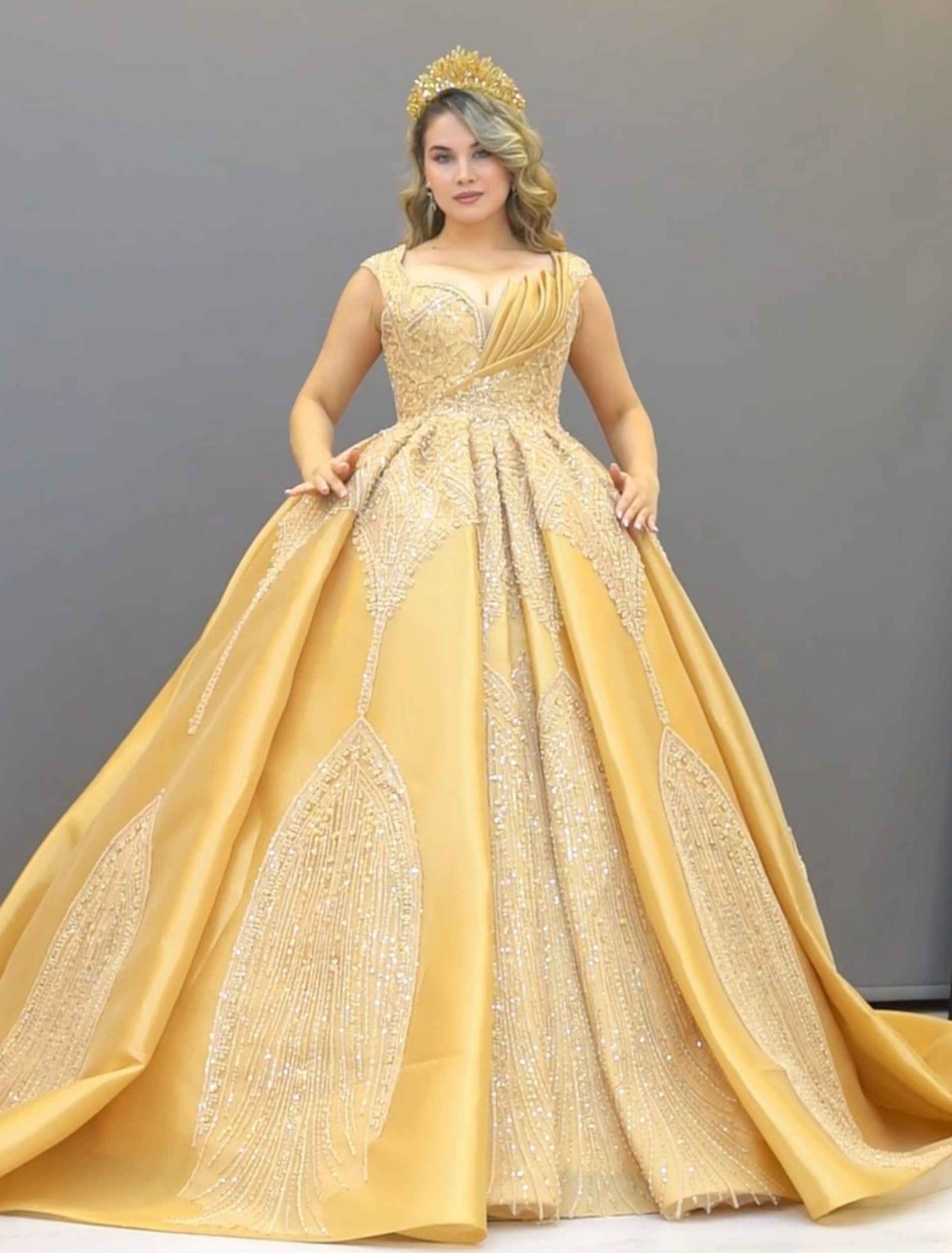 Champagne gold ball gown with off-shoulder neckline and glitter embroidery - Image 3